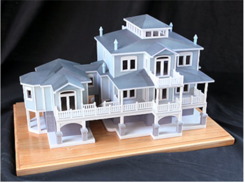  3D-gedrucktes Hausmodell mit verschiedenen Texturen.  